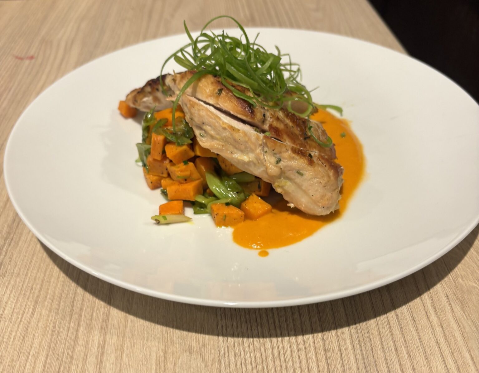 Cherrywood Roasted Eberly Farms Chicken with Warm Sweet Potato & Spring Onion Salad.